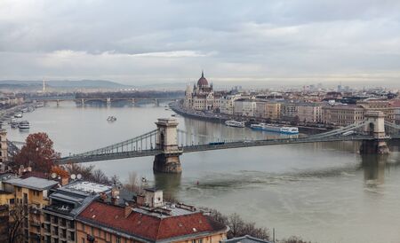 Morning in Budapest. Panoramic view of the city, Szechenyi Bridge and the building of the Budapest Parliament.の写真素材