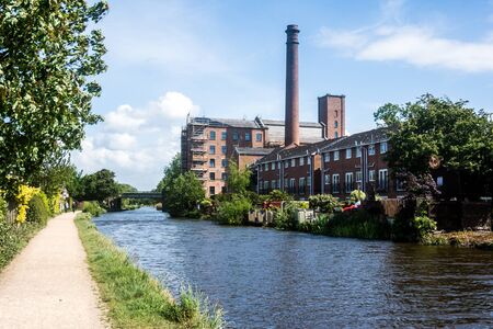 A former factory now converted into canalside apartments.