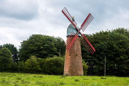 The Haigh Windmill was built in 1845 and was used to pump water to the reservoir at Haigh Brewery. It stopped working in the 1930s when the brewery closed.の写真素材