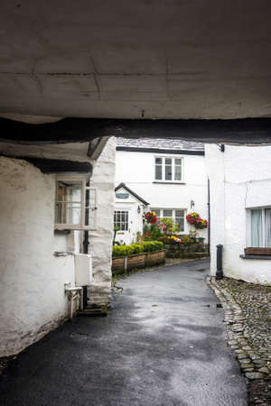 An old narrow and winding lane in Hawkshead village.