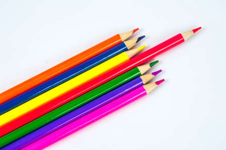 Colored pencils against white background.の写真素材