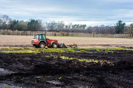 An excavator in a Lancashire field.の写真素材