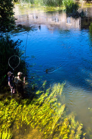Fishing on the River Avon at Bradford on Avon, Wiltshire.