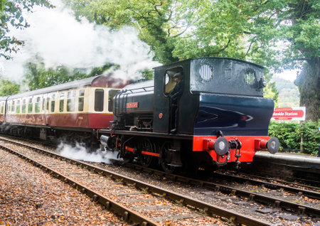 Steam train at Lakeside bound for Haverthwaite, Cumbria.の写真素材