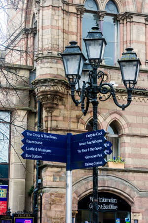 An ornate signpost outside Chester town hall.の写真素材