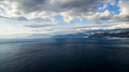 cloudy sea landscape greece islands from above santoriniの写真素材