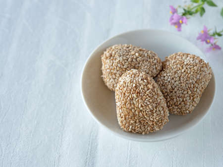 Japanese dessert sesame dumplings with red beanの写真素材