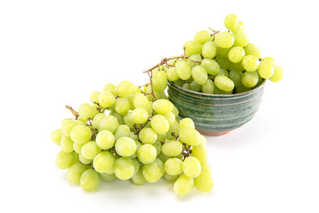 Green grape isolated on white backgroundの写真素材