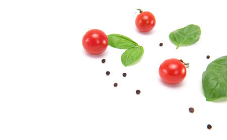 Tomatoes,Basil,pepper isolated on white background.の写真素材