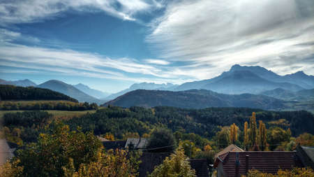 landscape with trees and mountainsの写真素材