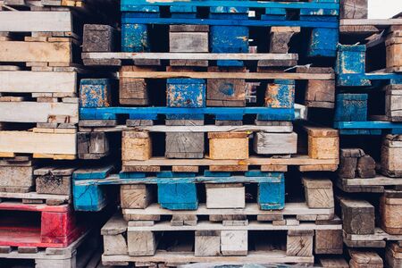 Pile of colorful wooden palletsの写真素材