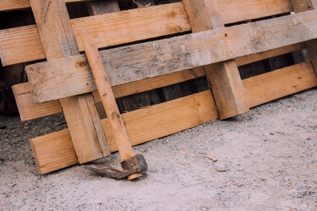 Wooden pallet and adzeの写真素材