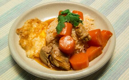 thai food rice carrot soup and egg friedの写真素材