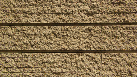 The pattern stone wall on background.