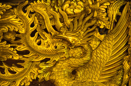 Golden bird crane carved decoratedの写真素材