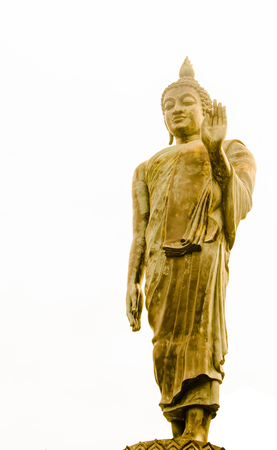 brass buddha statue at chumporn thailandの写真素材