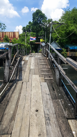 old wooden bridge on canalの写真素材