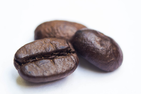 roasted coffee beans isolated on white background
