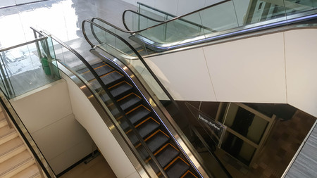 Escalator in modern shopping mall