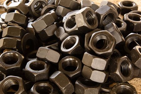 Nuts and bolts as industrial backgroundの写真素材