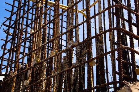 View on rusty square reinforcement for concrete
