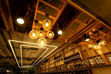 image of light bulb in hang on the ceiling.