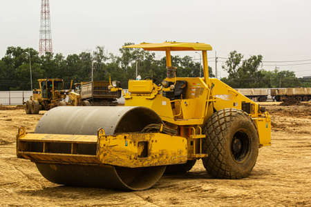 Heavy vibration roller compactor at compaction pavement works during ...