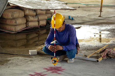 surveyor equipment theodolite at construction site