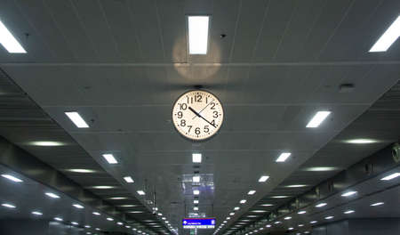 analog clock in train station in bangkok thailandの写真素材