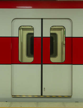 white&red slide door at train in bangkok thailandの写真素材