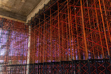 Concrete formwork and scaffolding on a construction site. Horizontally framed shot.の写真素材