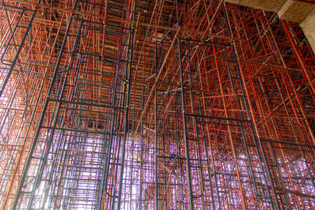Concrete formwork and scaffolding on a construction site. Horizontally framed shot.の写真素材
