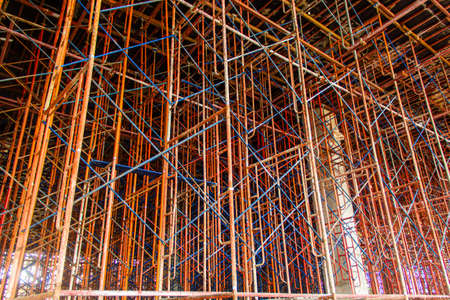 Concrete formwork and scaffolding on a construction site. Horizontally framed shot.の写真素材