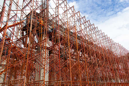 Concrete formwork and scaffolding on construction site. Horizontally framed shot.の写真素材