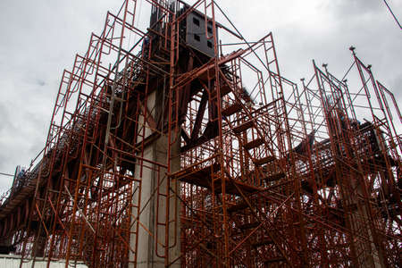 Concrete formwork and scaffolding on construction site. Horizontally framed shot.の写真素材
