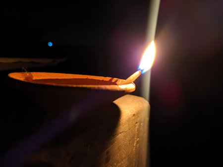 Glowing clay lamp and candle Happy diwali festive seasonÂ indian festival of dipawali