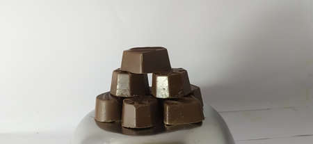 chocolate cut in indian village image white background chocolate chip image