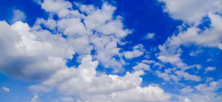 sky blue background image white clouds tree background image in indian village imageの写真素材