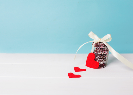 Chocolate with ribbon and heart on St. Valentine's day love.の写真素材