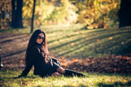 beauty woman relaxation on the green grassの写真素材