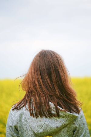 Beauty woman in flower field
