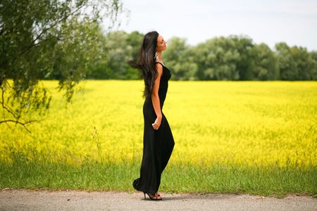 Walking beautiful young womanの写真素材