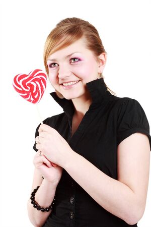 Portrait of beautiful girl with big lollipopの写真素材