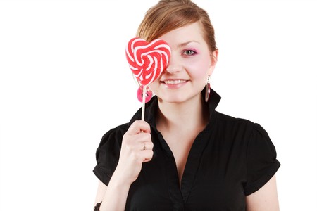 Portrait of beautiful girl with big lollipopの写真素材