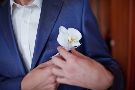 Groom getting flowersの写真素材