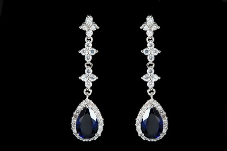 colored earrings on blackの写真素材