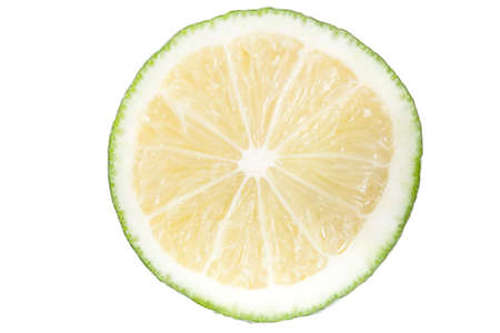 Slice of lime. isolated on whiteの写真素材