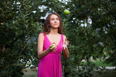 Beautiful young woman outdoor portraitの写真素材