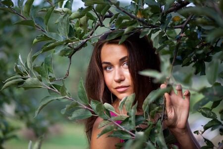 Beautiful young woman outdoor portraitの写真素材