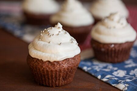 Chocolate cupcakes with cream cheese frostingの写真素材